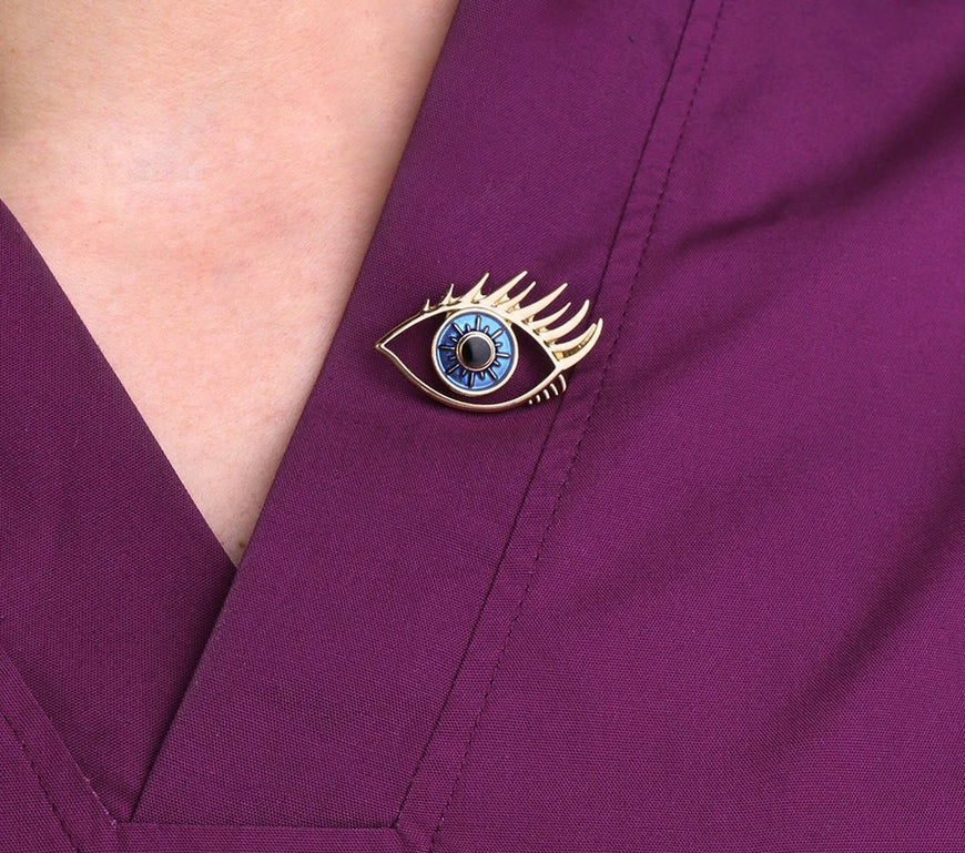 Eye gold pin